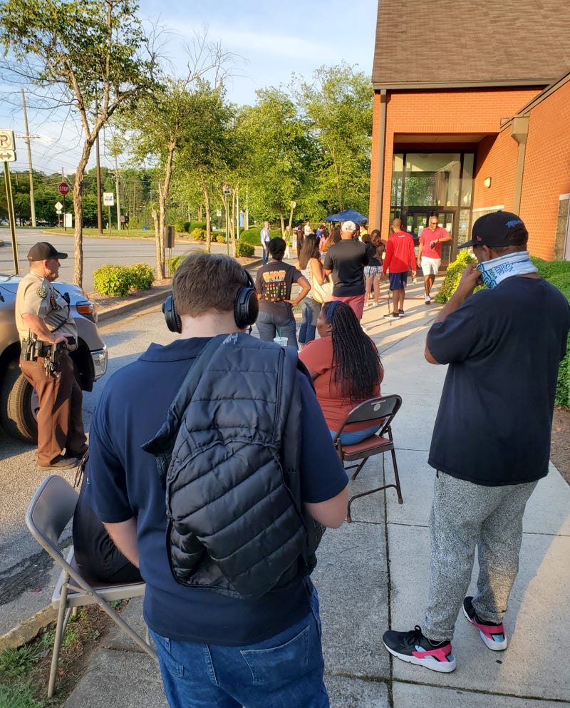 Residents wait to vote on the last day of early in person voting in Marietta GA.