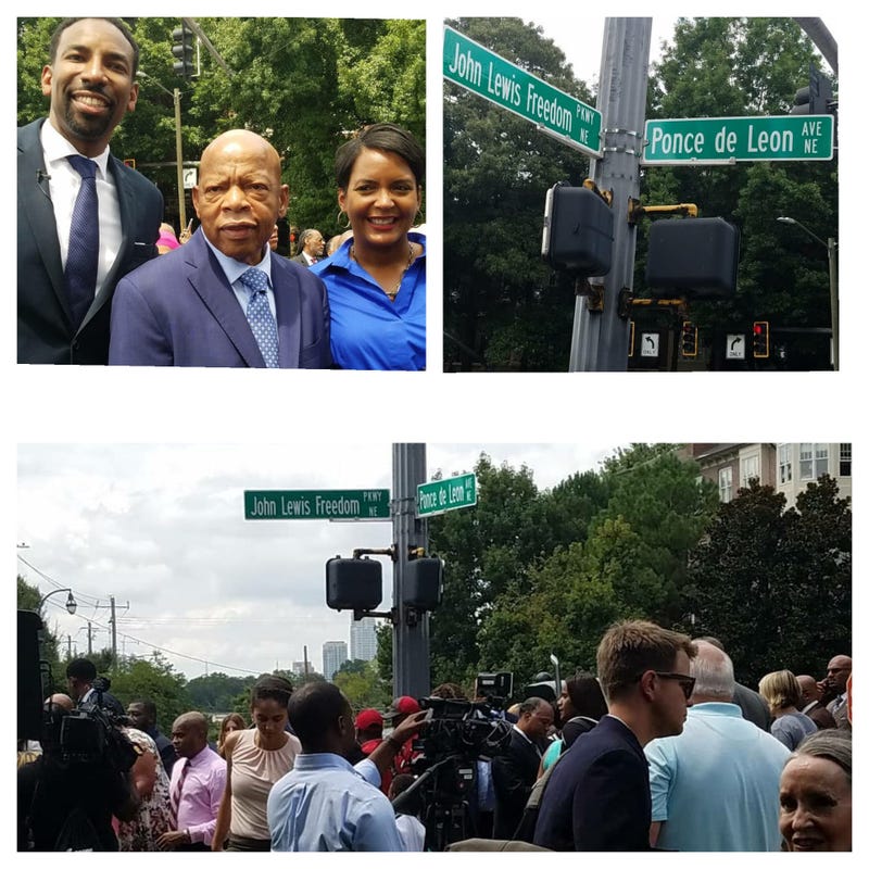 Rep John Lewis is show with Atlanta City Councilman Andre Dickens and Mayor Keisha Lance Bottoms at parkway renaming