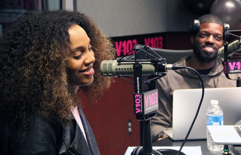 Jade Novah and JR of The Morning Culture smile during their first day on-air at V-103