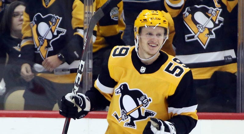 Pittsburgh Penguins left wing Jake Guentzel (59) reacts after scoring a goal
