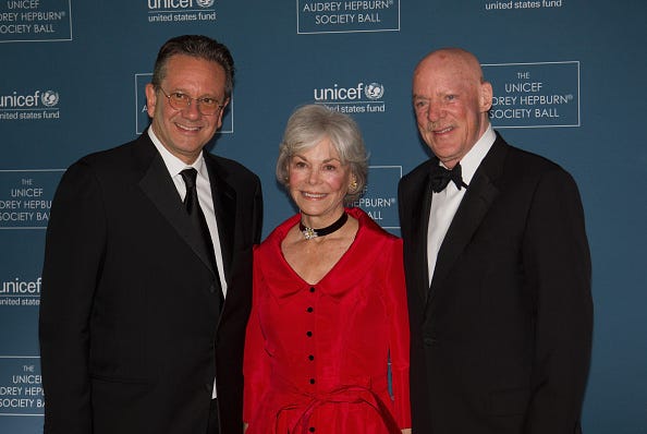 Janice McNair (c.) with her husband, Bob McNair (r.).