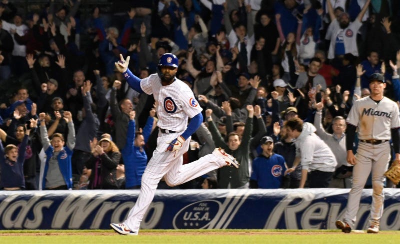 Cubs outfielder Jason Heyward rounds the bases after hitting a walk-off homer against the Marlins.