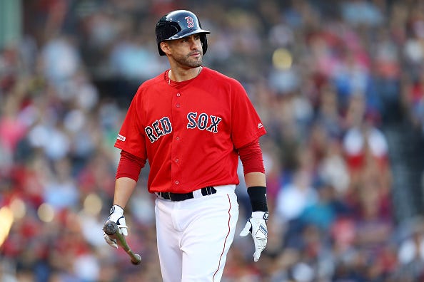 J.D. Martinez heads back to the dugout after a strikeout.