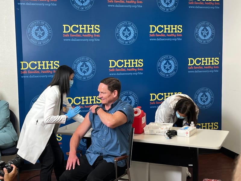 Person getting COVID shot