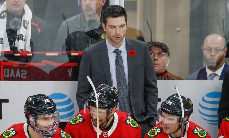 Blackhawks coach Jeremy Colliton looks on before a game against the Hurricanes.