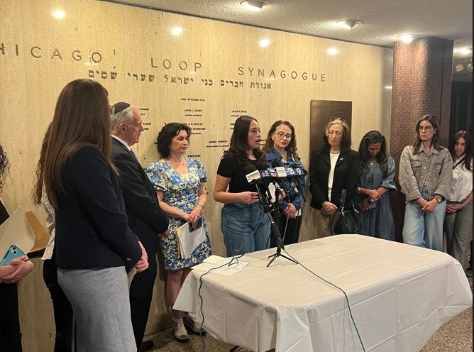 wo dozen people gathered at the Loop Synagogue on South Clark Street