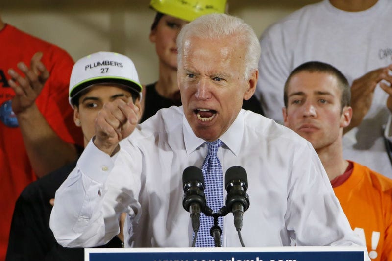 In this March 6, 2018 file photo, former Vice President Joe Biden speaks at a rally in Collier, Pa.