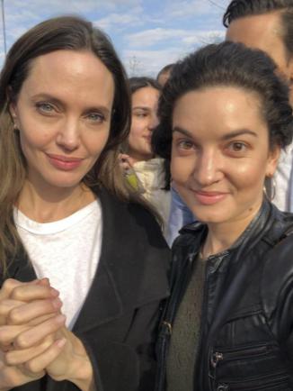 Angelina Jolie, Hollywood movie star and UNHCR goodwill ambassador, poses for photo with her fans in Lviv, Ukraine, Saturday, April 30, 2022. Ms Jolie was in Ukraine to meet the children affected by the war and visited hospitals and NGOs helping the injured and displaced.