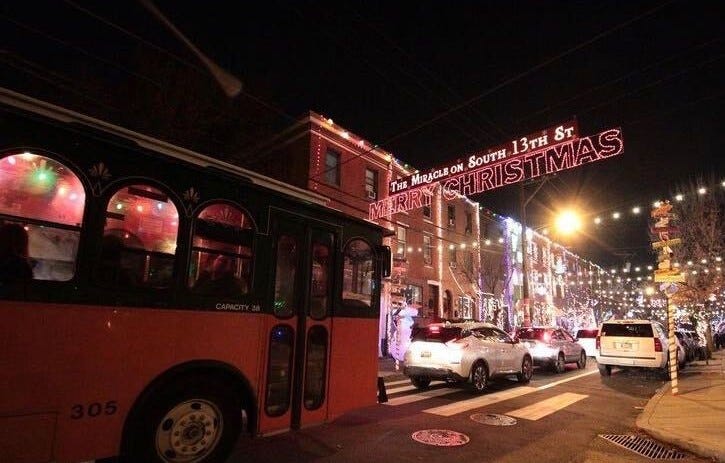 The "jolly trolley" bus on Founding Footsteps' holiday lights tour.