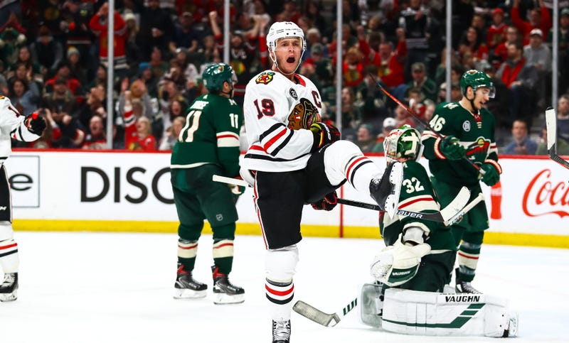 Blackhawks center Jonathan Toews (19) celebrates after scoring against the Wild.