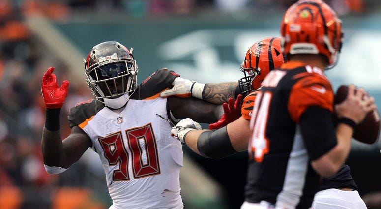 Buccaneers defensive end Jason Pierre-Paul (90) pursues Bengals quarterback Andy Dalton on Oct. 28, 2018, at Paul Brown Stadium in Cincinnati.