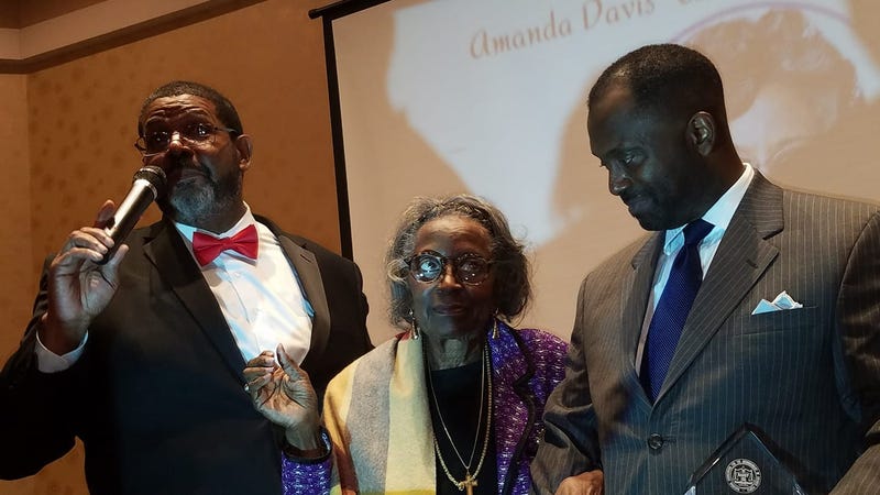 Mrs.Juanita Abernathy is flanked by Fulton County Commissioner Michael Lankford (l) and her son Kwame Abernathy (r) during award presentation in February 2019