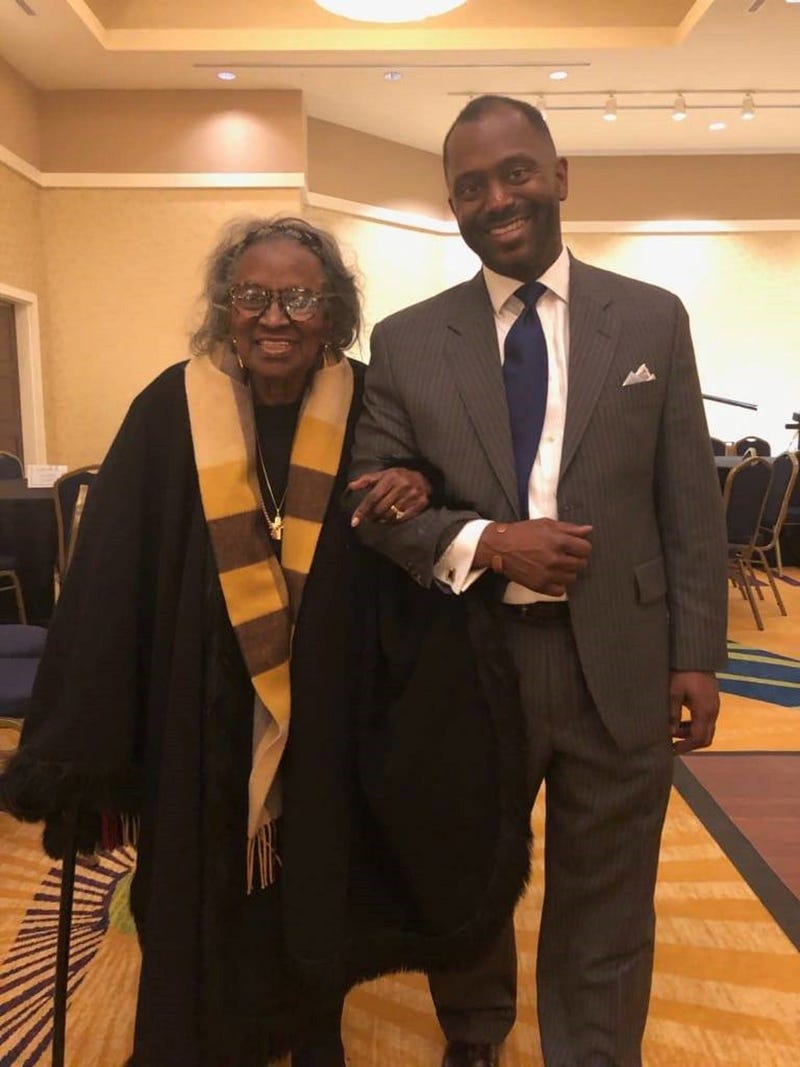 Mrs. Juanita Abernathy is seen being escorted by her son Kwame on Feb. 16, 2019 during a Black History program in Morrow GA