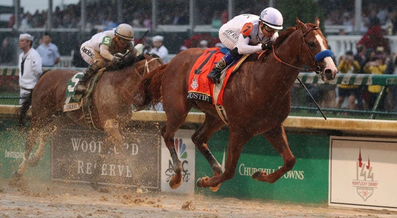 Mike Smith aboard Justify (7) beats Javier Castellano aboard Audible (5) to the finish line to win the 144th running of the Kentucky Derby on May 5, 2018, at Churchill Downs in Louisville, Kentucky.