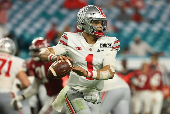 Justin Fields looks for a receiver down field