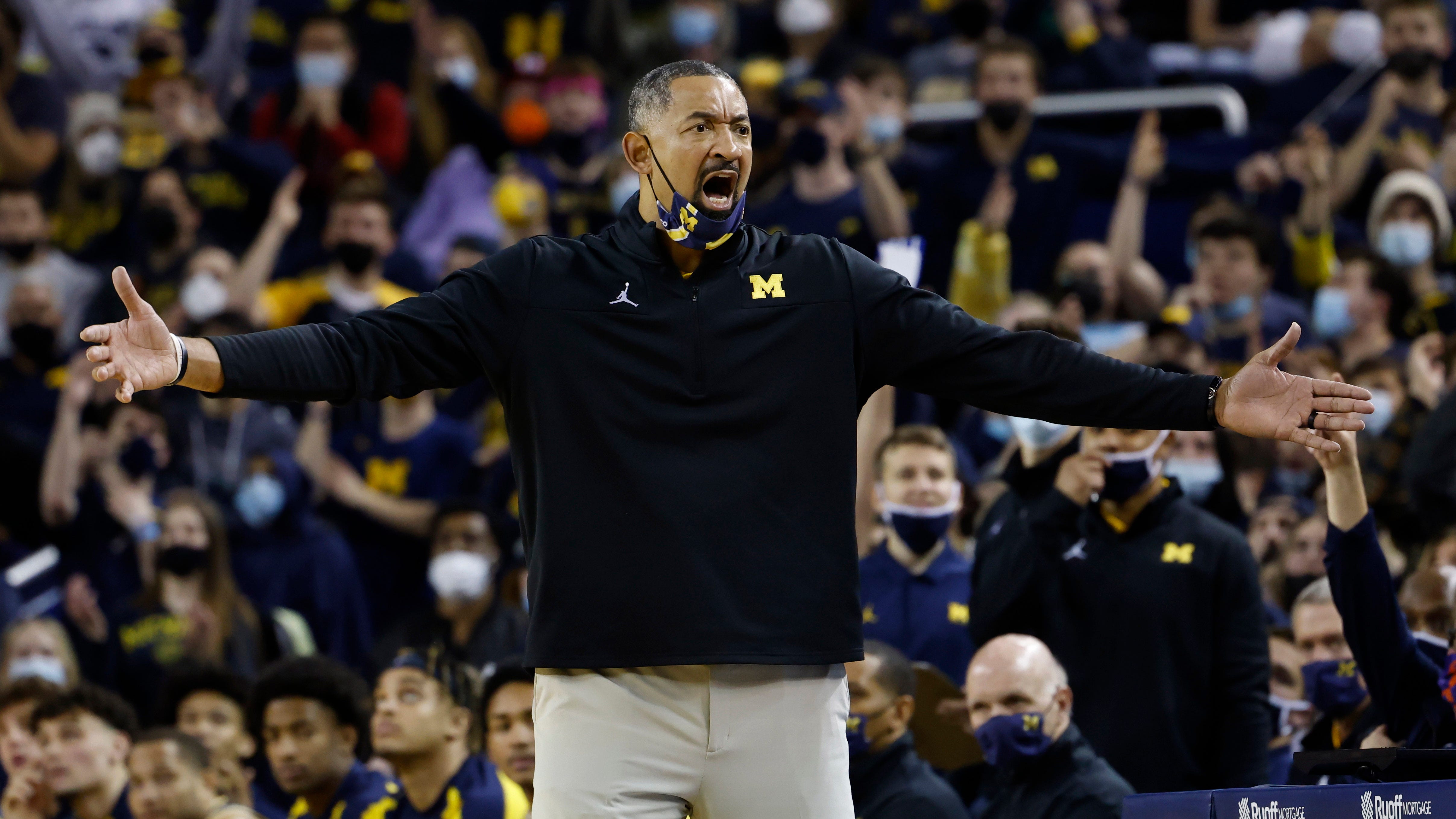 What should happen to Juwan Howard? Fans, media react to Michigan coach igniting brawl
