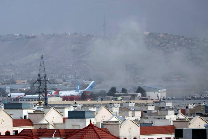 Smoke rises from an attack outside the Kabul, Afghanistan airport on August 26th, 2021