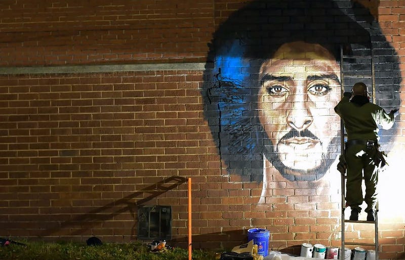 Artist Fabian Williams paints a new Colin Kaepernick mural in response to his "Kaeplanta" mural being demolished on Feb 1 before Super Bowl 53