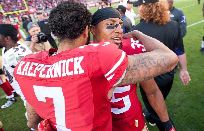 Colin Kaepernick hugs Eric Reid 