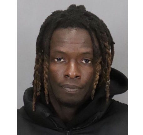 Jonathan Kassi is facing charges of extortion and attempted disorderly conduct.