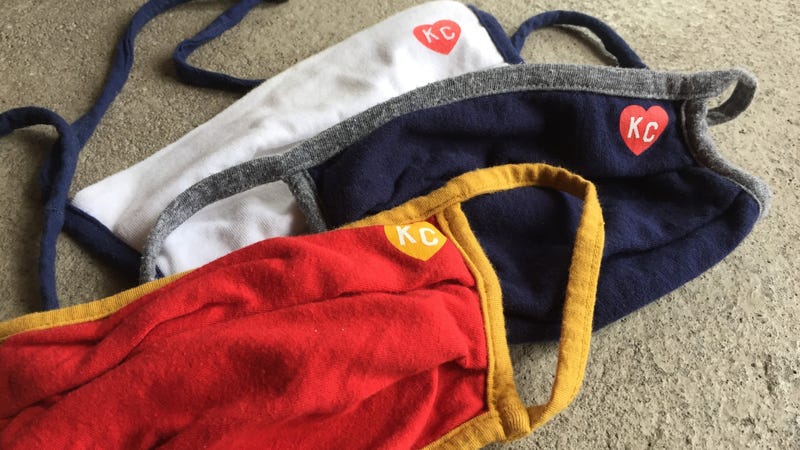A pile of face masks with KC logo