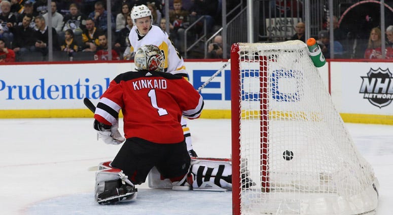 Penguins center Nick Bjugstad (not shown) scores a goal on New Jersey Devils goaltender Keith Kinkaid on Feb. 19, 2019, at the Prudential Center.
