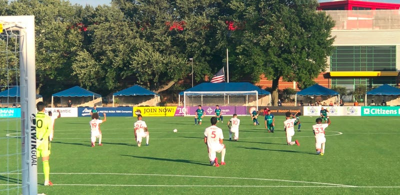 Loudoun and Hartford Athletic players kneel during National Anthem in support of BLM