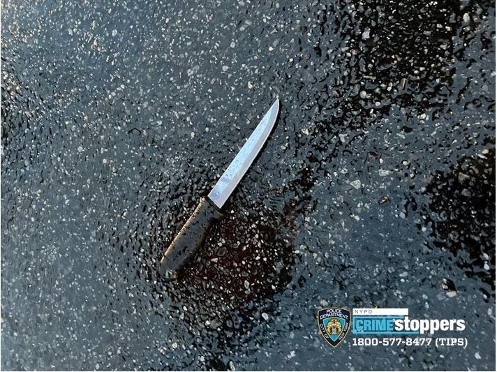 The knife police recovered from a quadruple family homicide in Queens Sunday morning.