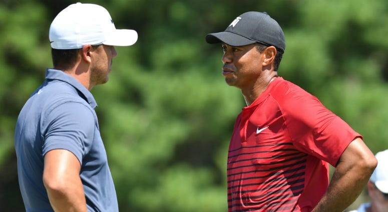Brooks Koepka and Tiger Woods