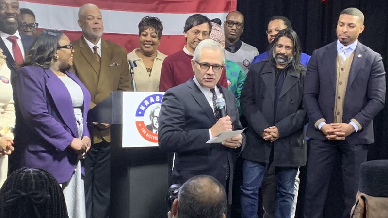 District Attorney Larry Krasner surrounded by officials and others as he announces his campaign for re-election.