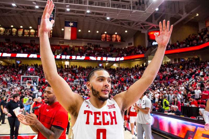 Forward Kevin Obanor #0 of the Texas Tech Red Raiders signals after the college basketball game against the Kansas Jayhawks at United Supermarkets Arena on January 08, 2022 in Lubbock, Texas.