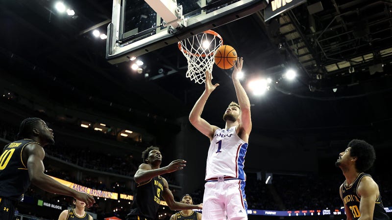Hunter Dickinson #1 of the Kansas Jayhawks grabs a rebound during the 1st half of the game against the Wichita State Shockers at T-Mobile Center on December 30, 2023 in Kansas City, Missouri