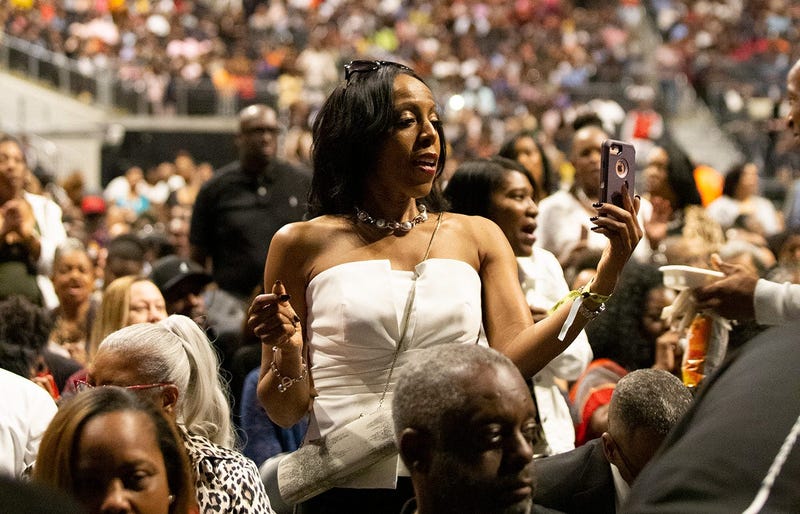 A lady stands at V-103 LIVE on Saturday, March 30, 2019, at State Farm Arena in Atlanta
