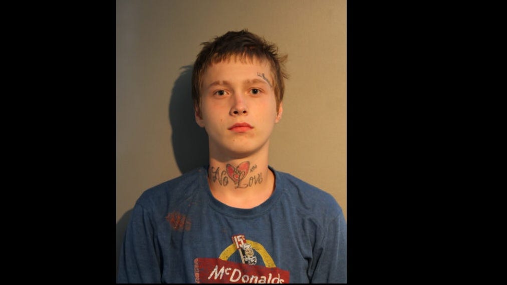 Man charged with shooting at police station in Rogers Park