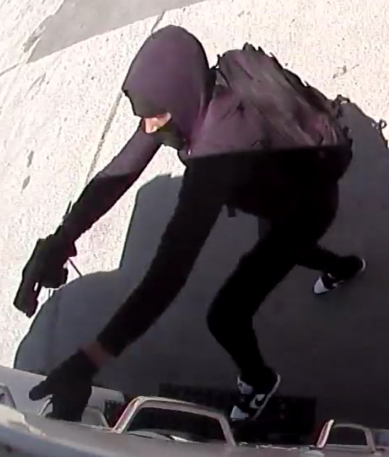 suspect with gun