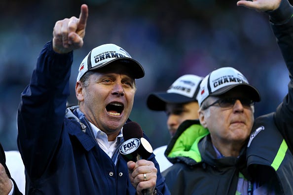 Steve Largent celebrates the Seahawks winning the NFC Championship Game.