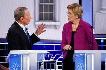 Democratic presidential candidate, former New York City Mayor Mike Bloomberg talks with Sen. Elizabeth Warren, D-Mass., during a break at a Democratic presidential primary debate Wednesday, Feb. 19, 2020, in Las Vegas. (AP Photo/John Locher)