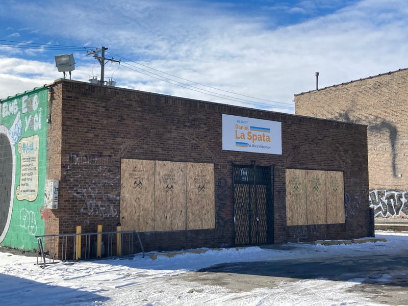 smashed windows at front of campaign office