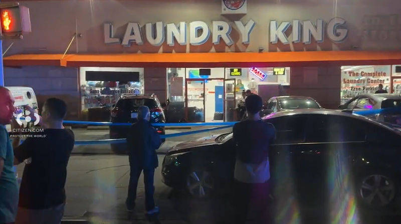 A 54-year-old father was killed and his 19-year-old son injured at a Brooklyn laundromat on Sunday night.