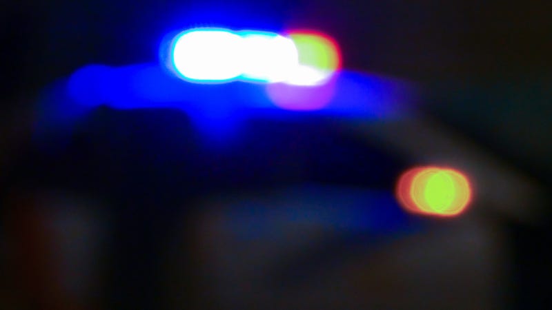 Police car with siren, defocused - stock photo