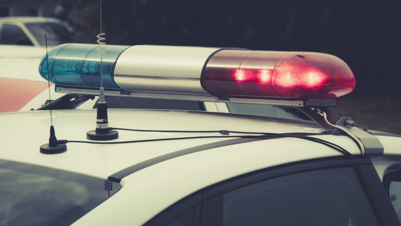Close up of a swithched rotating beacon of a police car - stock photo