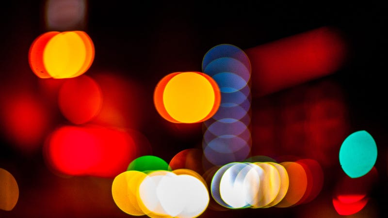 Lighting equipment, illuminated and defocused at night - stock photo