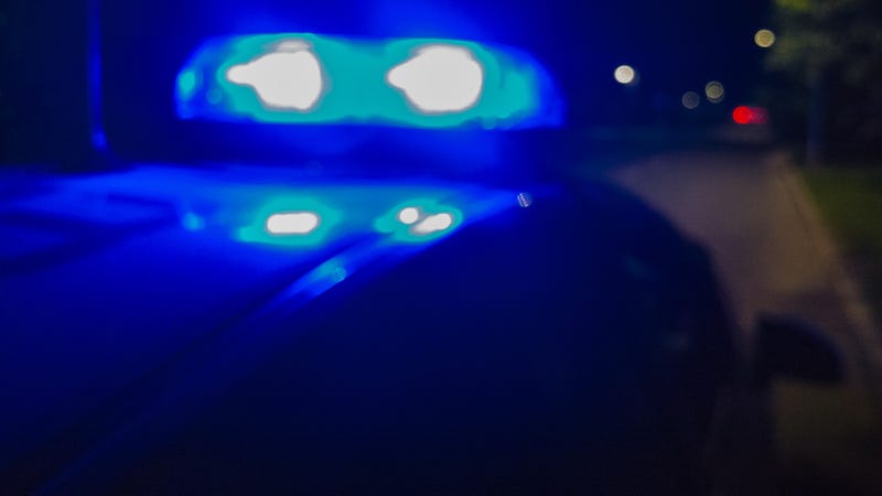Lights of police car in night time. Abstract blurry image. - stock photo