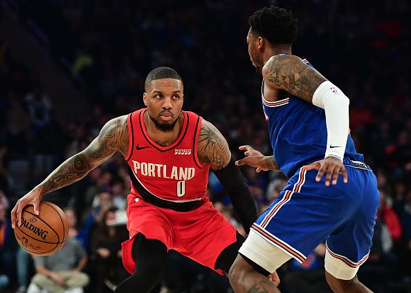 Damian Lillard looks to make a move on Knicks' Elfrid Payton. 