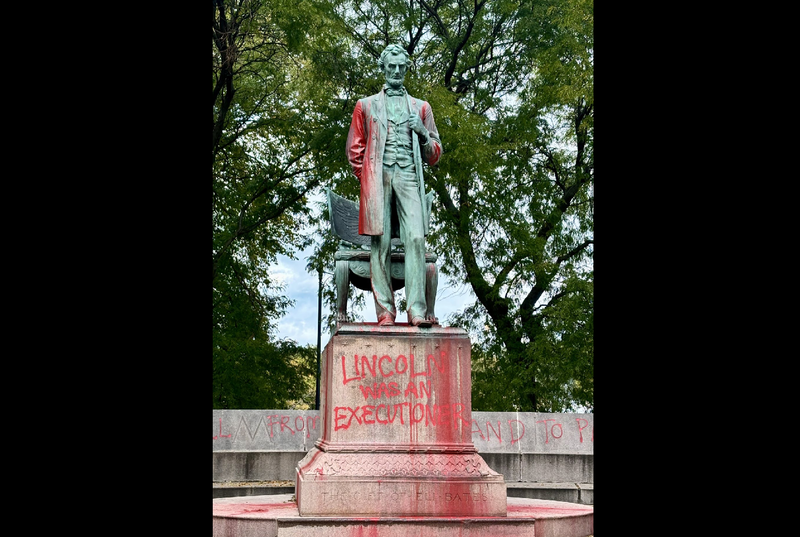The Abraham Lincoln statue near the Chicago History Museum was targeted by vandals, who spray-painted statue and left one message that read: "Lincoln was an executioner."