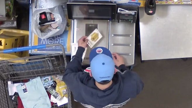 WANTED: Unidentified man who used stolen credit cards at Livonia Walmart self-checkout [VIDEO]