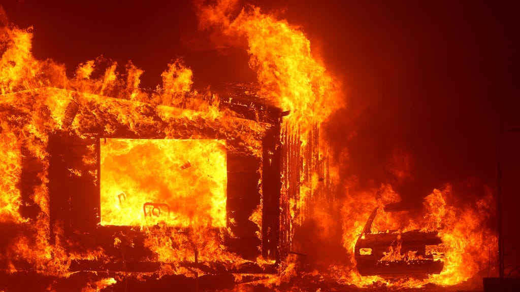 Major wildfire started in attempt to cover up a murder, sheriff's officials say