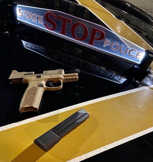 speeding driver found with loaded gun