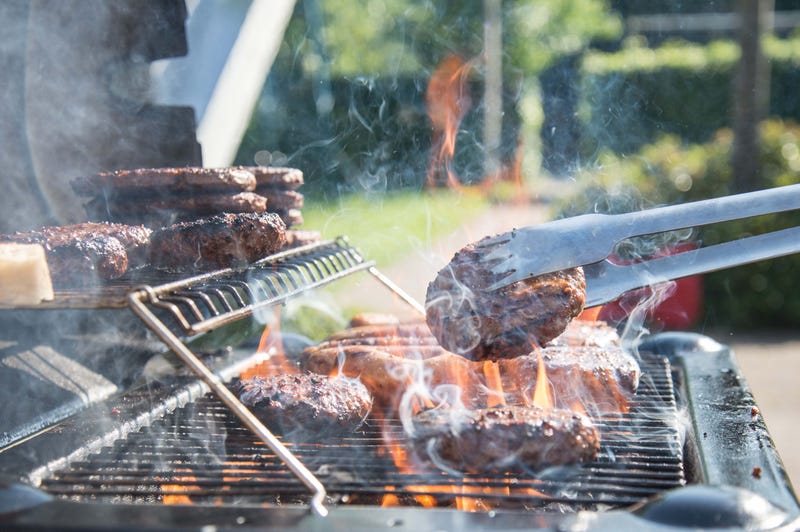 long handled tongs used to flip food on a grill