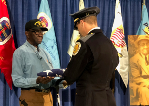 Prince George's County Police return a lost American flag to the family of the owner, a former World War I veteran.